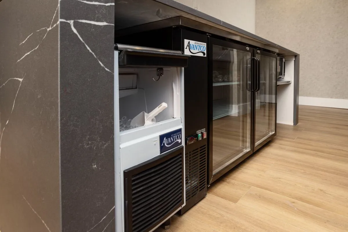 Ice machine and glass-door under-counter refrigerator in the kitchen island
